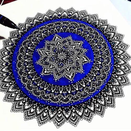 11 X 14 mandala drawn with black ink and colored in with dark blue and gray marker, finished with silver and white paint dots. 

SOLD OUT 