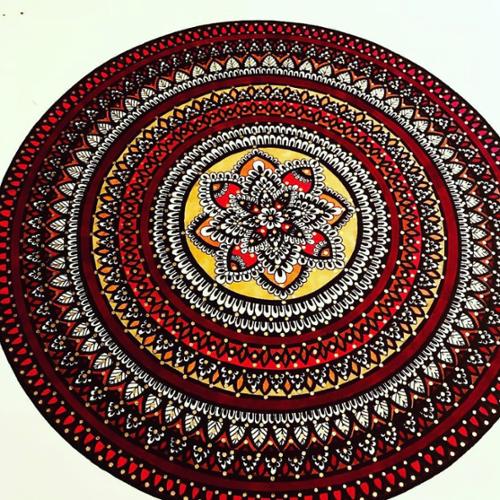 11 X 14 mandala drawn with black ink. Colors are inspired by Deepika Padukone's red lehenga during the song "Nagada Sang Dhol" in the movie "Ram Leela". Colors include red, metallic yellow, orange, gold, and is finished with gold and black paint dots. 

This item comes with a frame. 

Price: $250